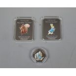 2 x The Tales of Peter Rabbit silver plated ingots together with Peter Rabbit 50 pence coin