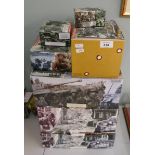 Collection of scale military vehicles and figures