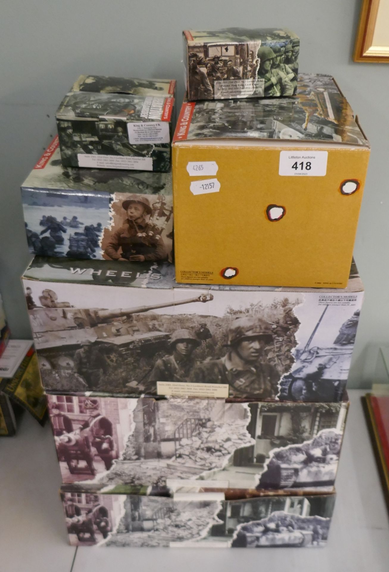 Collection of scale military vehicles and figures