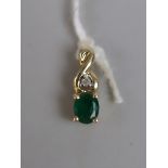 9ct gold emerald and diamond set pendant