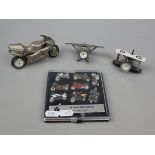 Boxed set of 10 Jahre BMW K-Serie pin badges together with a metal bike clock and 2 metal plane