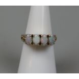 9ct gold 4 stone opal set ring - Size: K
