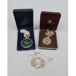 2 silver commemorative medals on chains together with another medal