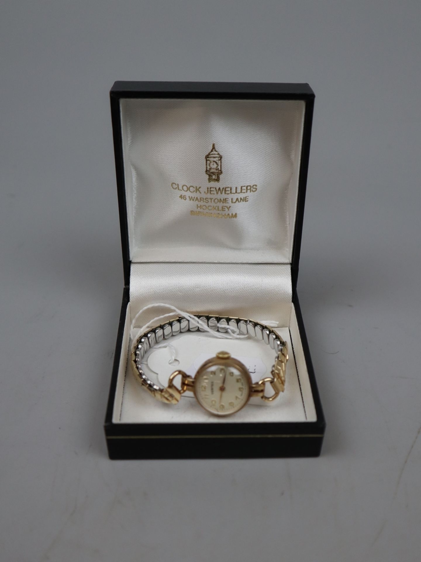 Gold cased ladies watch