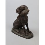 Bronze dog with catch figure