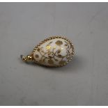 Gilded egg pendant marked 78