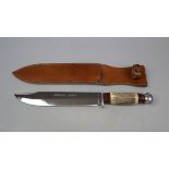 Original Bowie knife in sheath