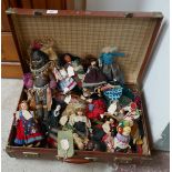 Collection of vintage dolls in suitcase