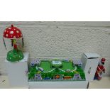 Wind up tin plate toys to inclde drummer soldier, cars on road and mushroom merry go round