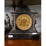 Ansonia mantle clock with gold bezel glass face