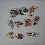 Collection of enamelled brooches