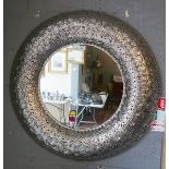 Round ornate framed mirror