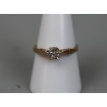 9ct gold diamond solitaire ring - Size O