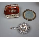 Hallmarked silver picture frame together with a white metal tea strainer and a plated champagne