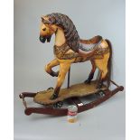 Small wooden child's rocking chair with real horse hair tail originally from a fairground ride