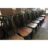 Set of 12 wheel-back chairs