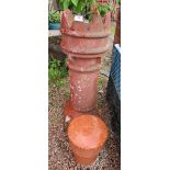 Large chimney pot together with a small chimney pot