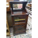 Mahogany music cabinet