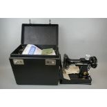 Singer sewing machine 221K PAT tested in good working order in case with original service book