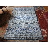 Blue patterned rug - Approx size: 226cm x 154cm