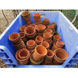 Large collection of terracotta plant pots