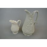 Parian ware moulded jug with classical scene together with similar smaller example with moulded