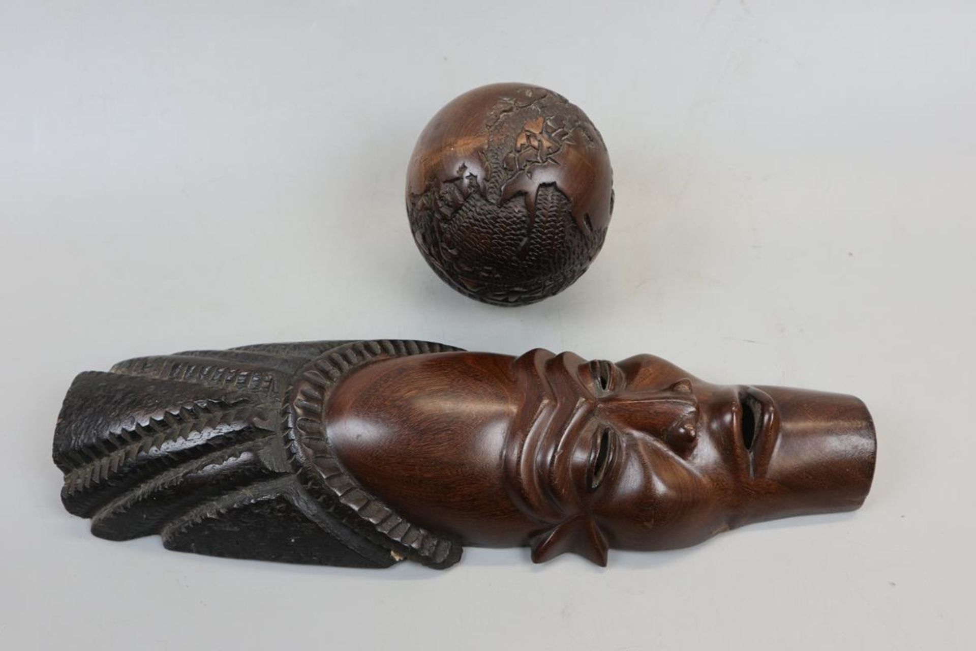 Vintage carved World globe trinket box together with a wall mask