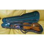 Cased violin with 2 bows