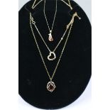 3 x 9ct gold stone set pendants on chains