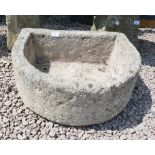 Antique D shaped stone trough