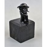 Old Bill black painted mascot on wooden base