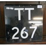 Square metal sign marked TT 267