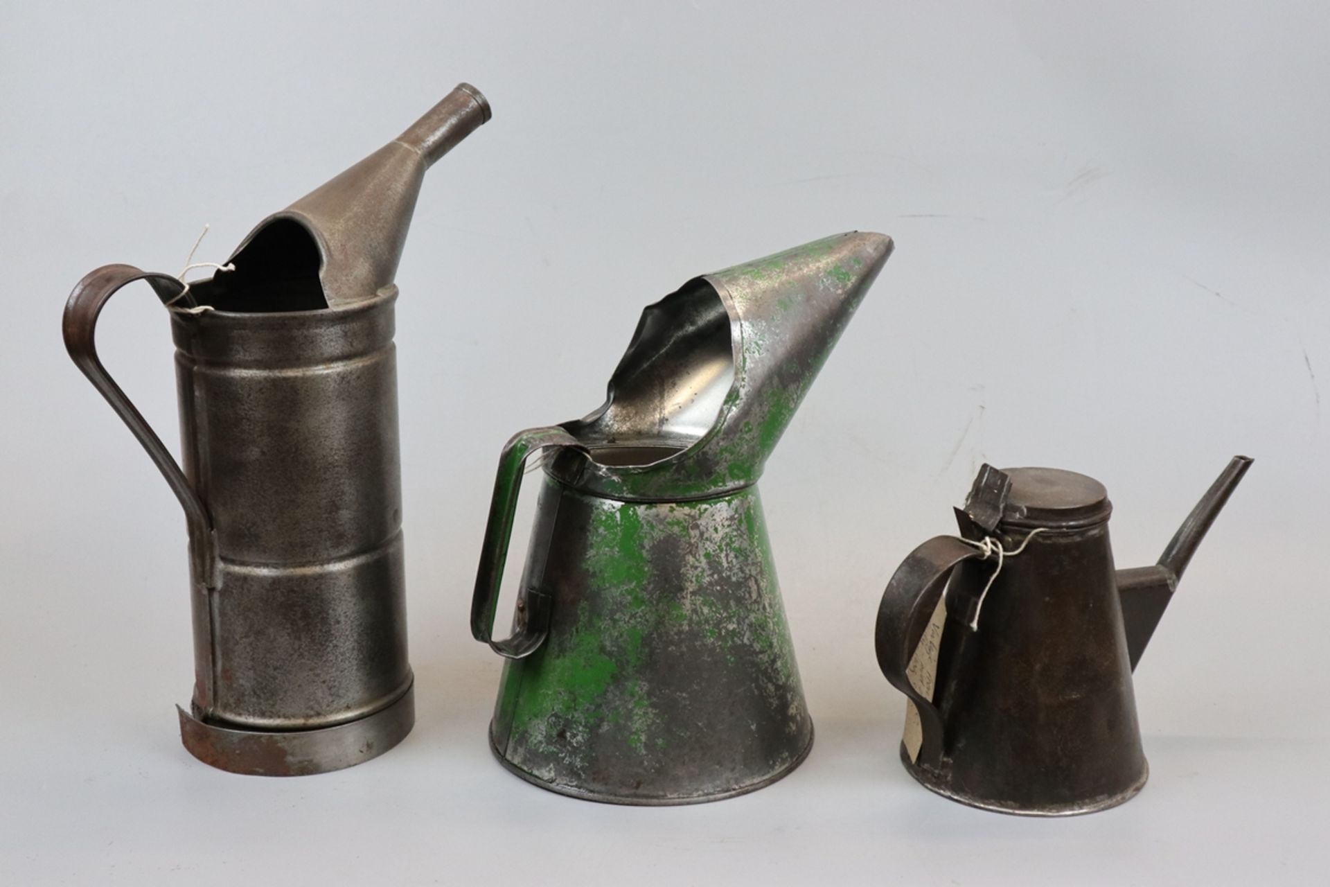 3 vintage oil cans one to include crown mark, marked Paramount Basildon