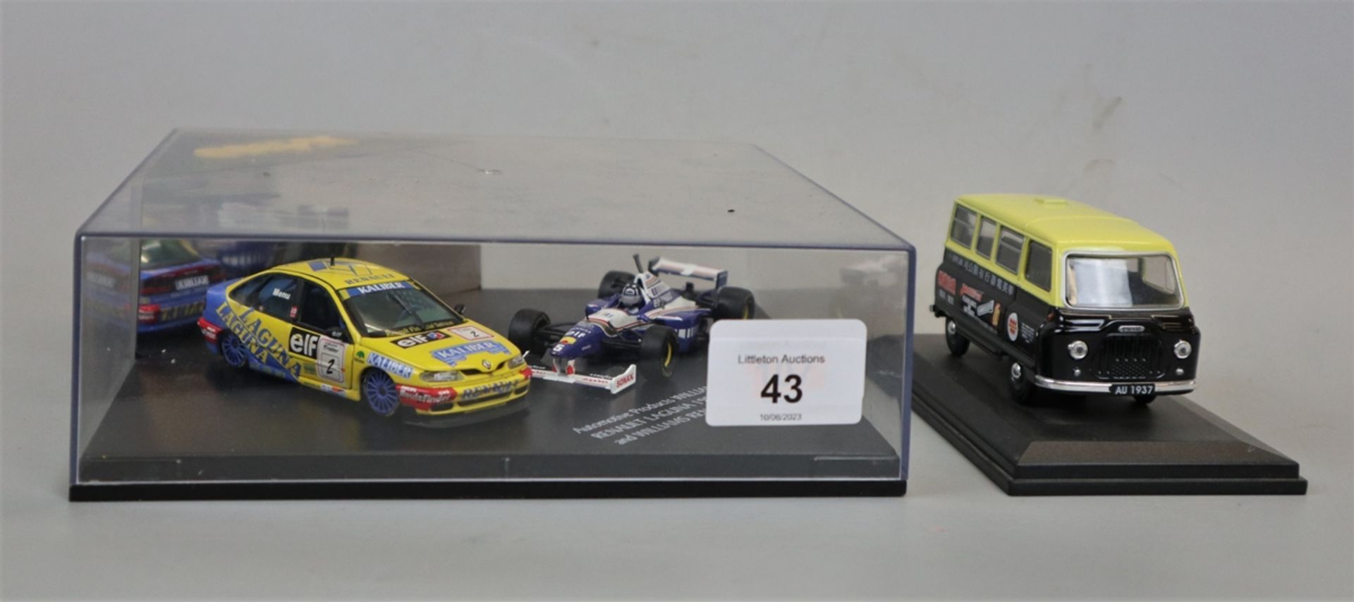 Model Renault Laguna 1996 touring car set together with a model Winchester J2