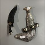 Arabic Jambiya dagger with white metal scabbard together with another dagger