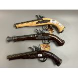 3 reproduction flintlock pistols