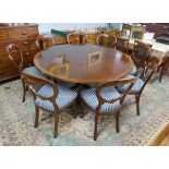 Good quality reproduction circular mahogany dining table with 8 balloon back chairs