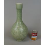 Antique Chinese celandon glazed vase decorated with stylised dragons & scrolls - 4 character marks