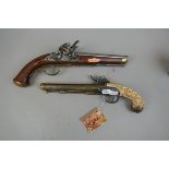 2 reproduction flintlock pistols