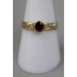 18ct gold ruby & diamond set ring - Size P