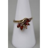 9ct gold stone set garnet ring with 1 missing stone - Size N