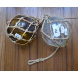 2 glass pond floats