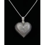 Large silver heart pendent on chain