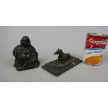 Antique bronze dog together with bronzed Buddha