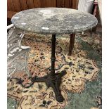 Small cast iron table with natural stone top