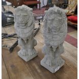 Pair of stone lion ornaments - Approx height: 35cm