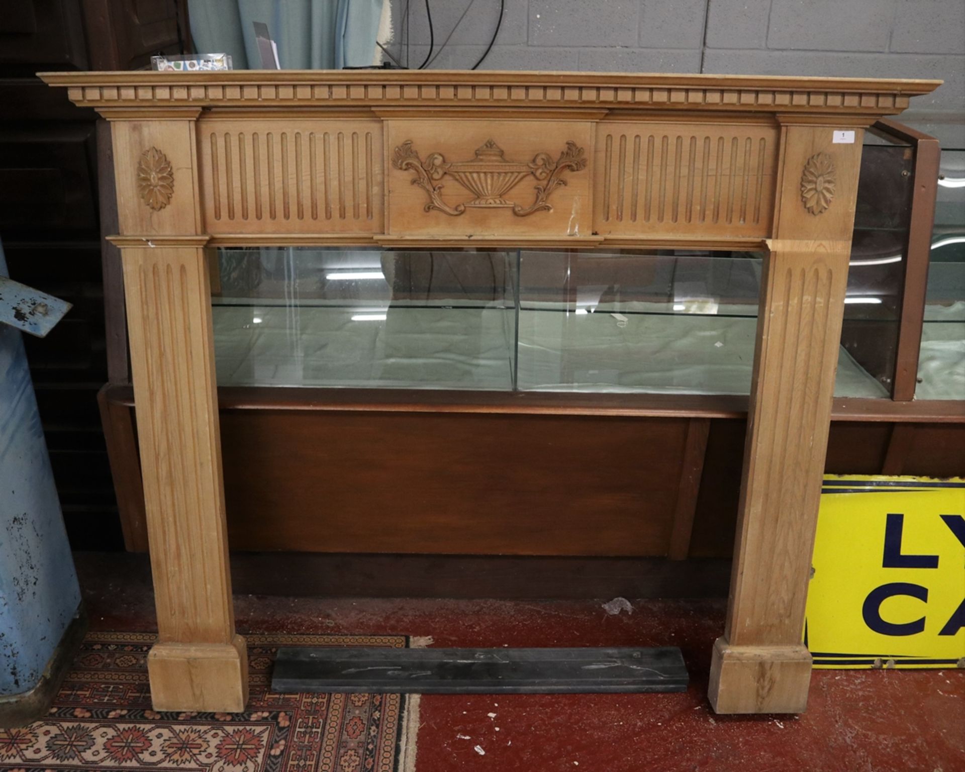 Wooden fire surround together with slate pieces