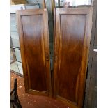 A pair of solid walnut armoire doors