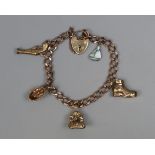9ct gold charm bracelet - Approx weight 22.8g