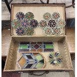 Stained glass panels in vintage suitcase